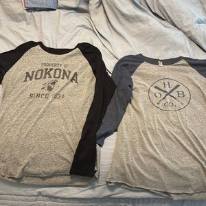 2 baseball long sleeve shirts.